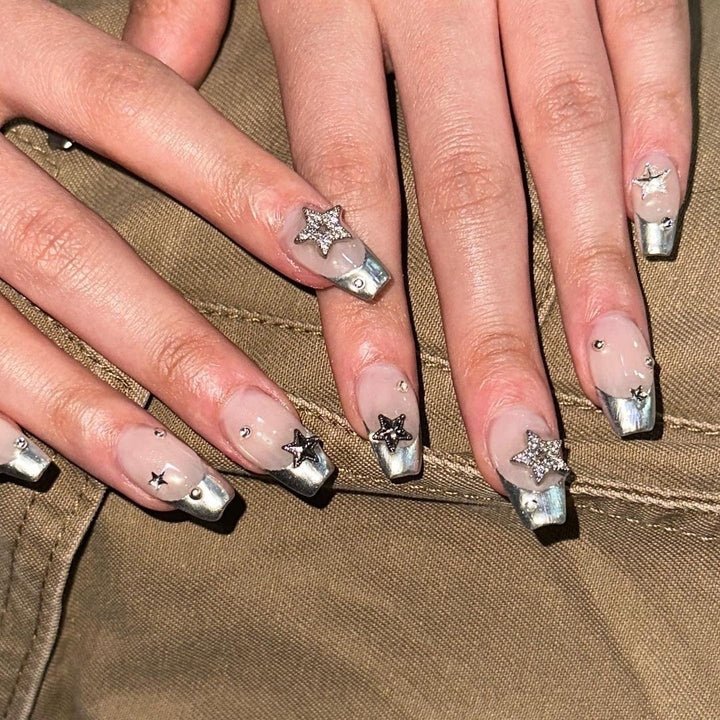 Glamorous acrylic nails with sparkling star design Stornfield