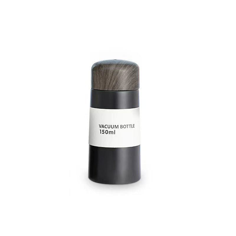 Women vacuum-insulated water bottle with innovative wooden lid Stornfield