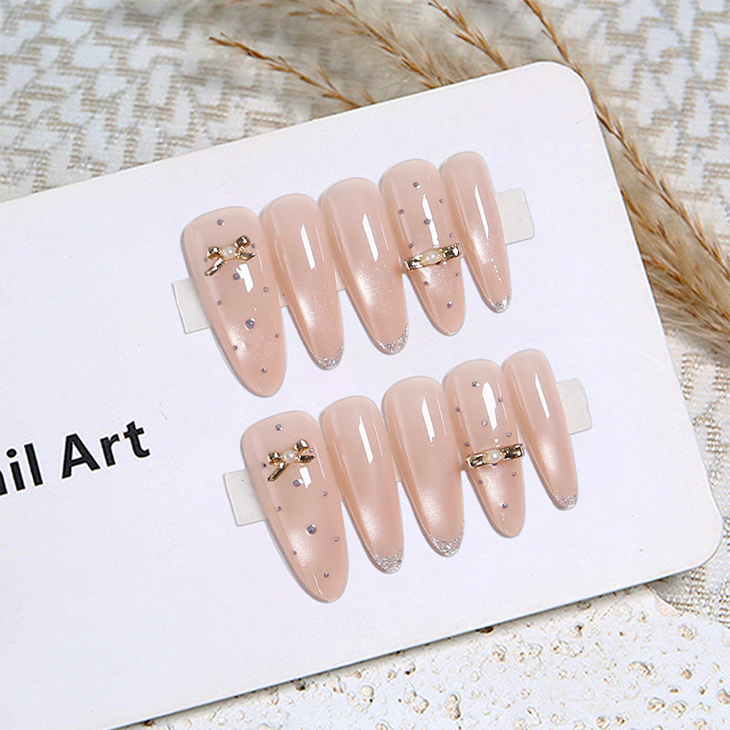 Acrylic nail set with elegant jewelry details Stornfield