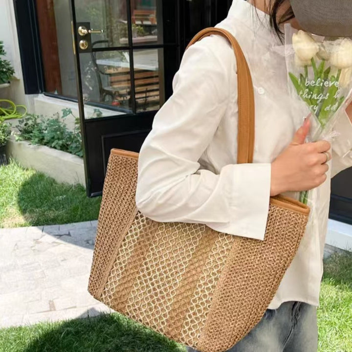 Elegant Bast Handbag with Leather Accents Stornfield