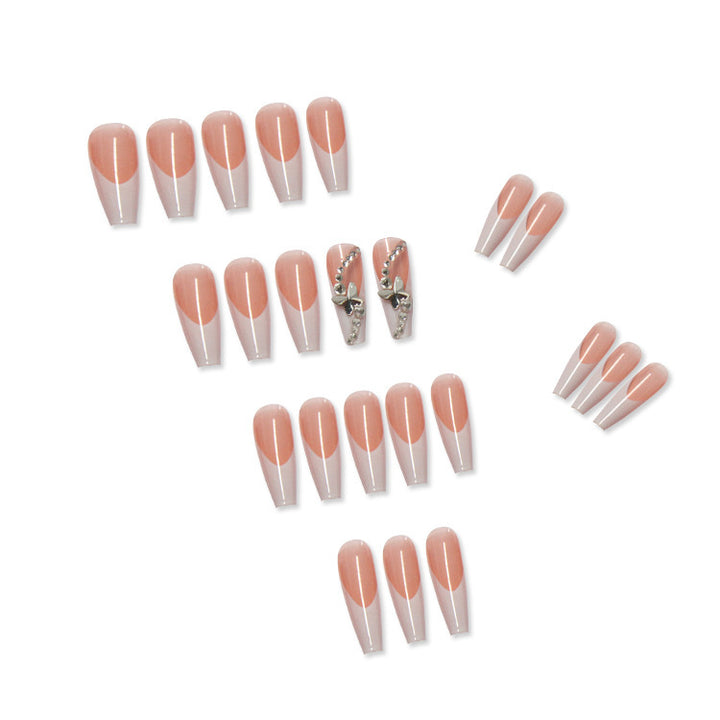 Acrylic nail set with glamorous tips embellishments and elegant accents Stornfield