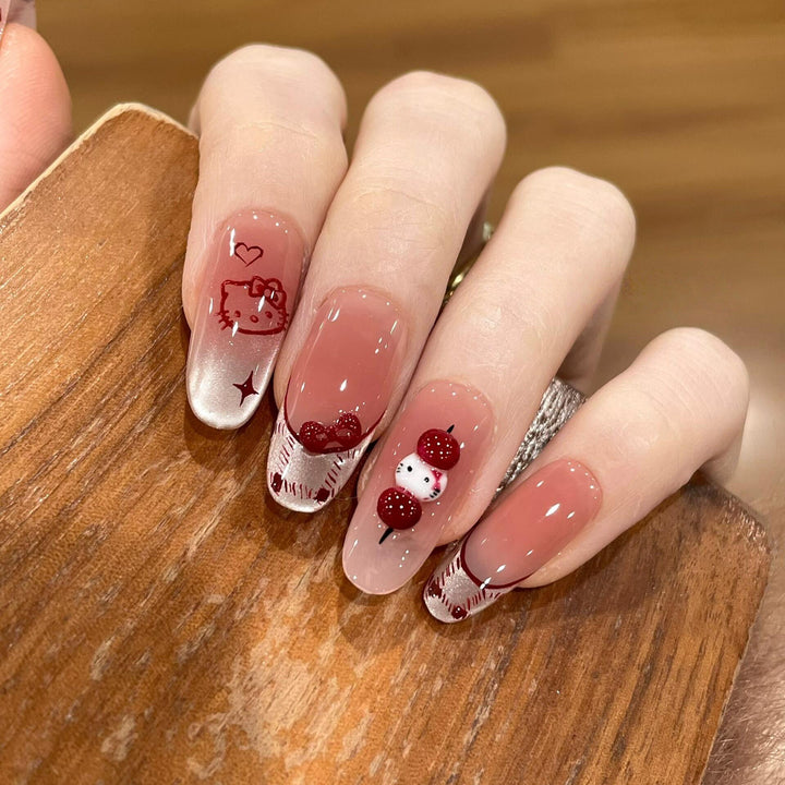 Artificial nails with playful Hello Kitty design Stornfield
