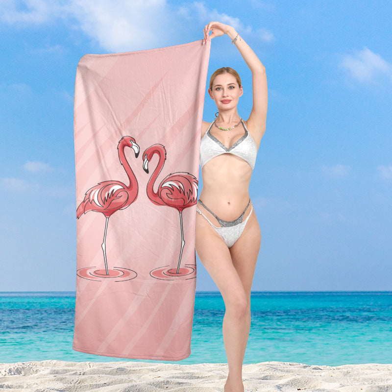 Premium beach towel with vibrant flamingo design Stornfield