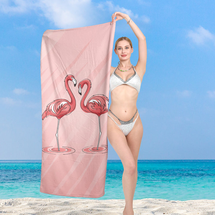 Premium beach towel with vibrant flamingo design Stornfield