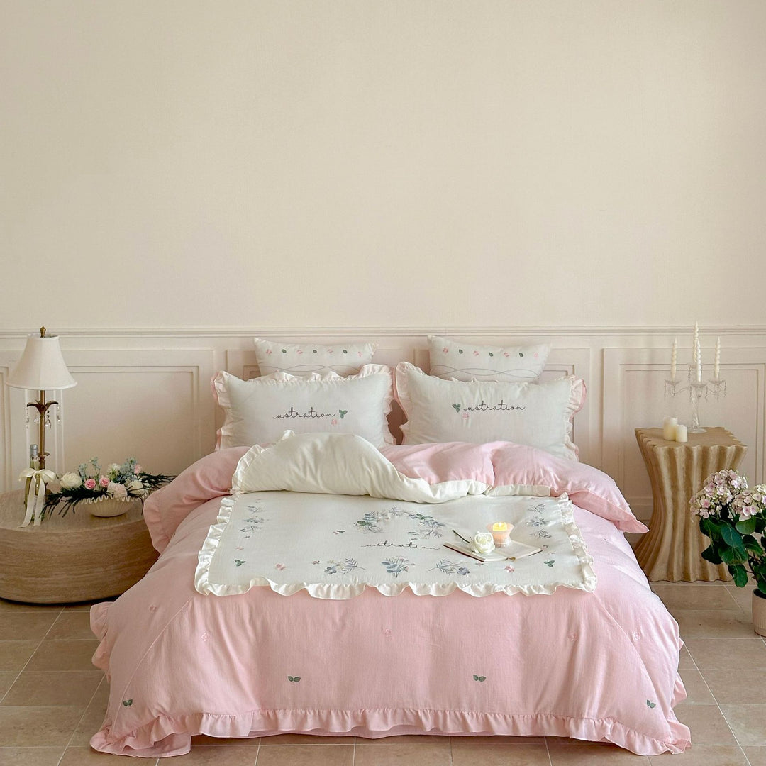 Cotton bedding set in country house style with ruffle edge and fine floral embroidery Stornfield