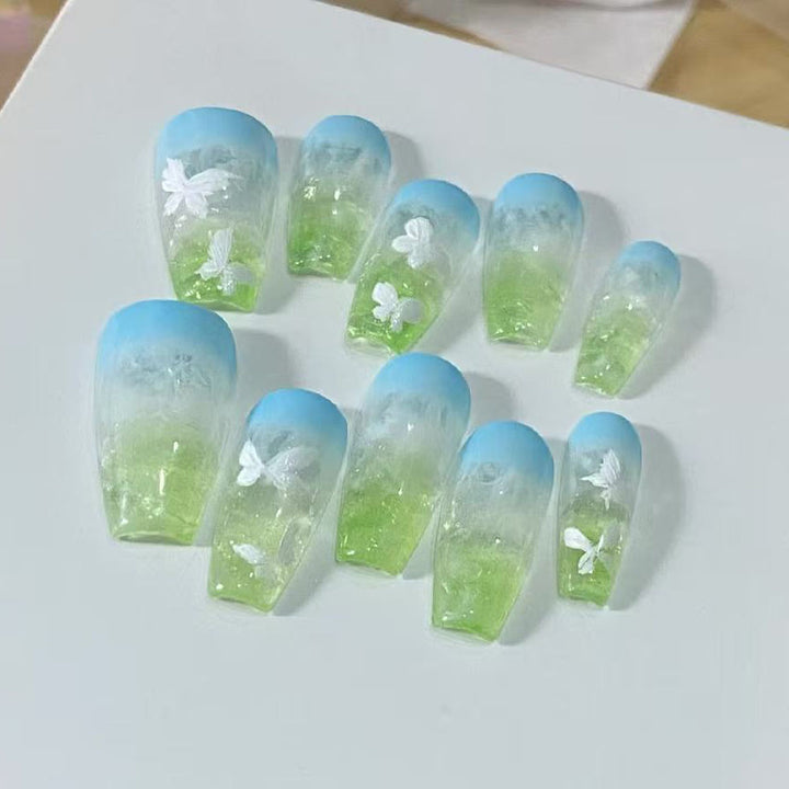 Artificial nails in summer style with butterfly design Stornfield
