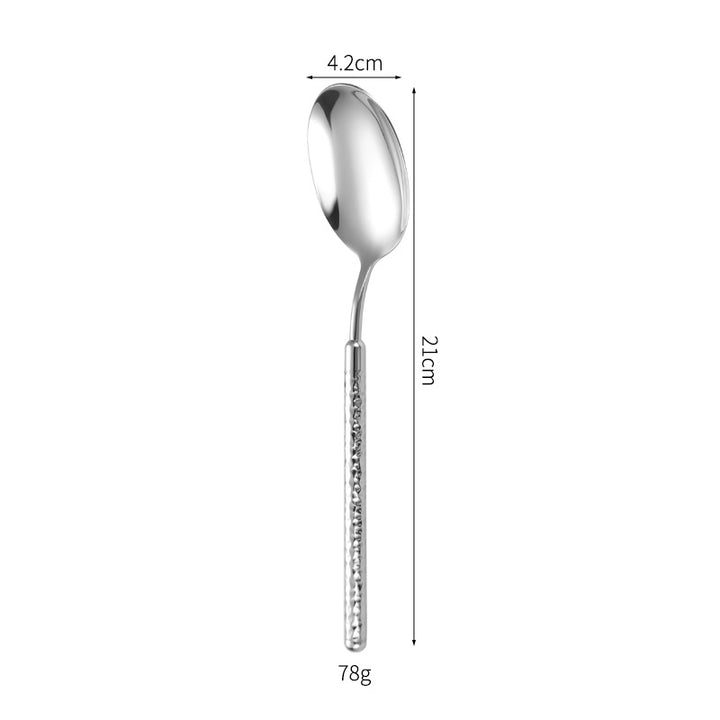 Elegant dessert spoon with elaborate handle design Stornfield