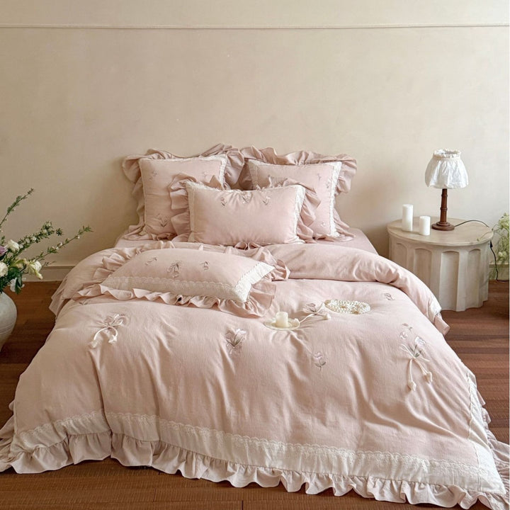 Romantic cotton bedding set with ruffles and floral embroidery