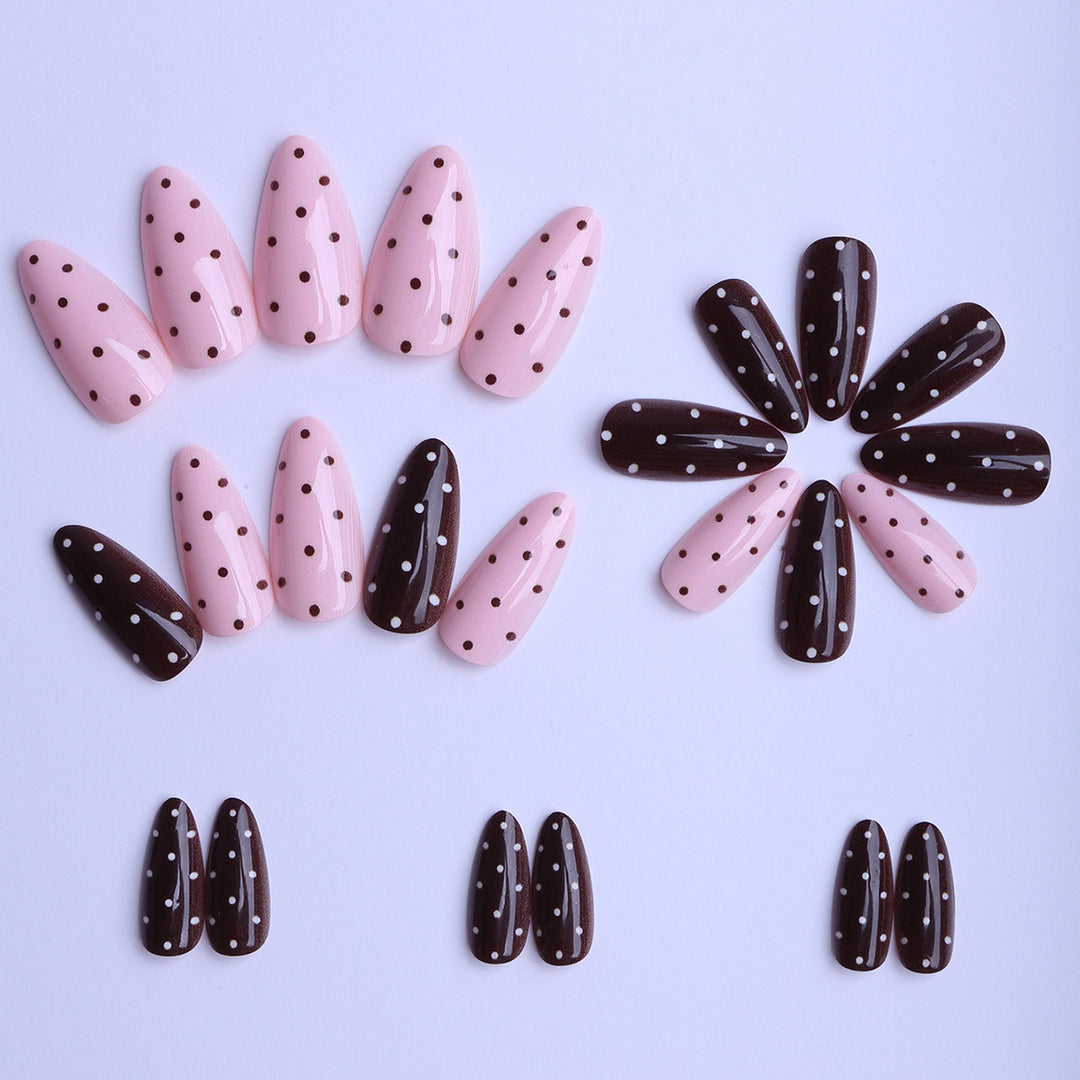 Artificial nails with creative dot pattern and elegant accents Stornfield