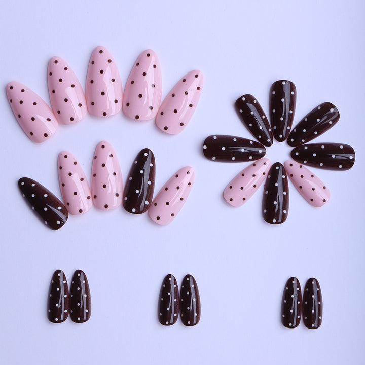 Artificial nails with creative dot pattern and elegant accents Stornfield