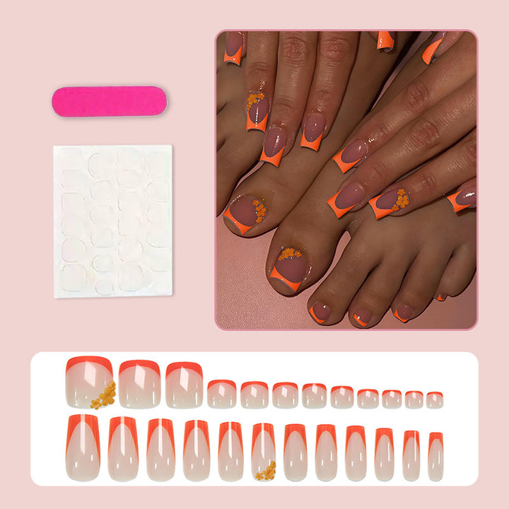 Artificial nail set with stylish orange neon accents Stornfield