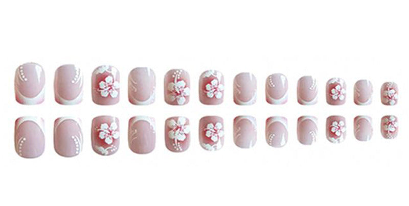 Acrylic nail set with elegant flower and French tip designs Stornfield