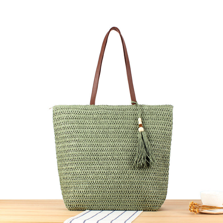 Handbag Made of Braided Natural Material with Tassel Decoration Stornfield