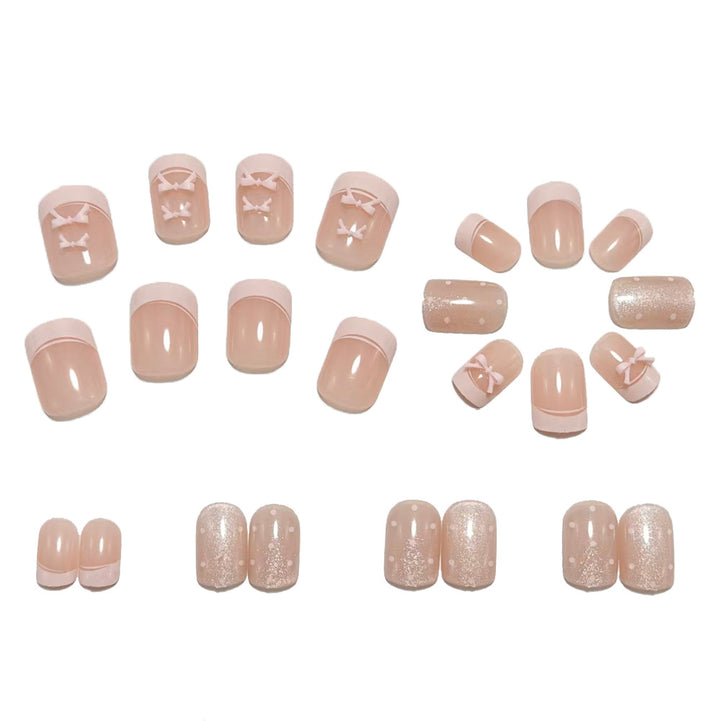 Artificial nails with delicate bows and glitter accents Stornfield