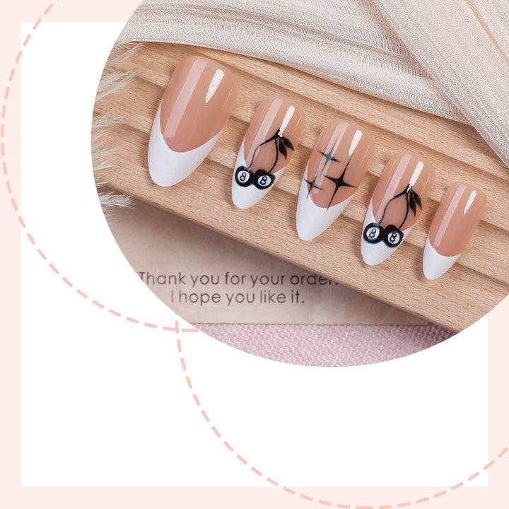 Creative nail art set with hand-drawn designs and French tips Stornfield
