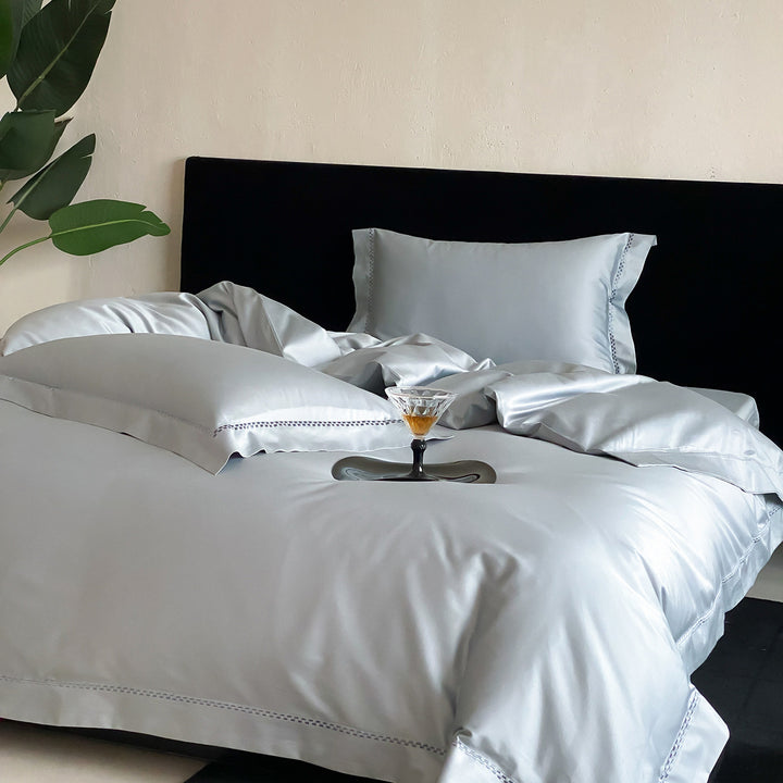 Premium Satin Bedding Set with fine hemstitch embroidery and silky smooth finish