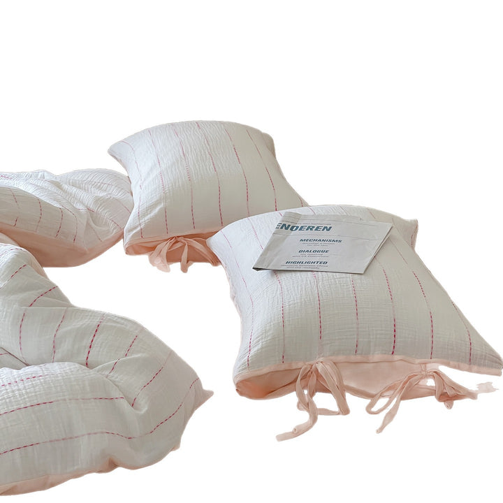 Quilted cotton muslin bedding set with fine longitudinal stitch quilt structure