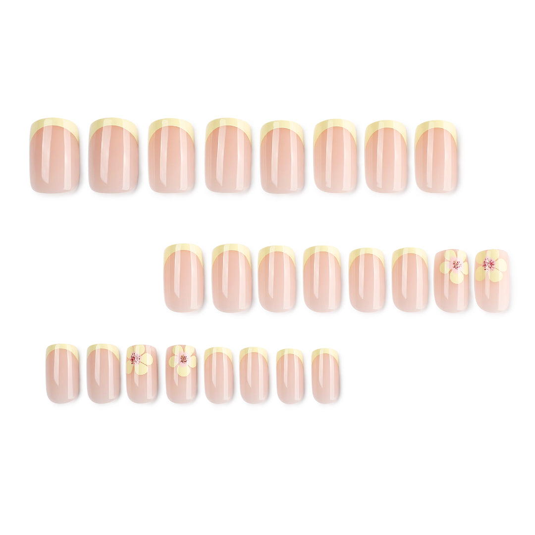 Artistic French-tip nails with floral decorations Stornfield