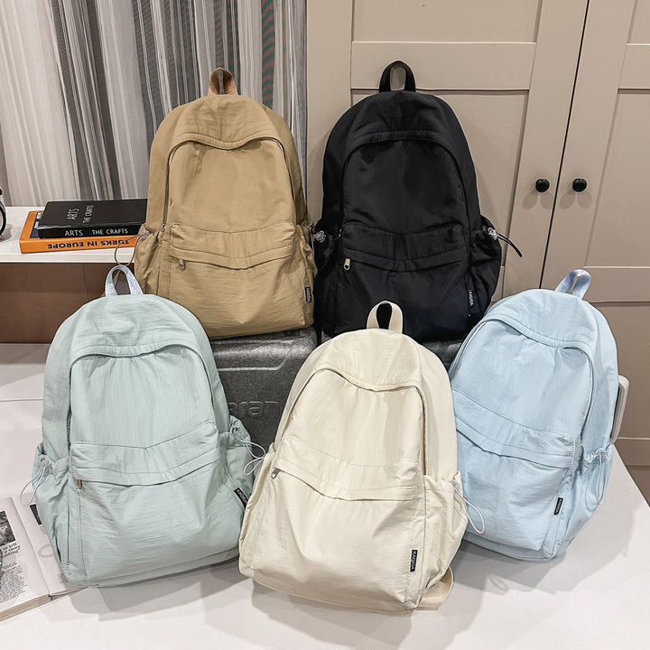 Sporty backpack with practical side pockets Stornfield
