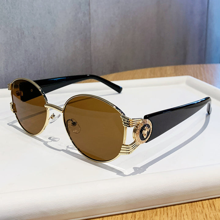 Ladies elegant sunglasses with luxurious metal frame and mirrored lenses Stornfield