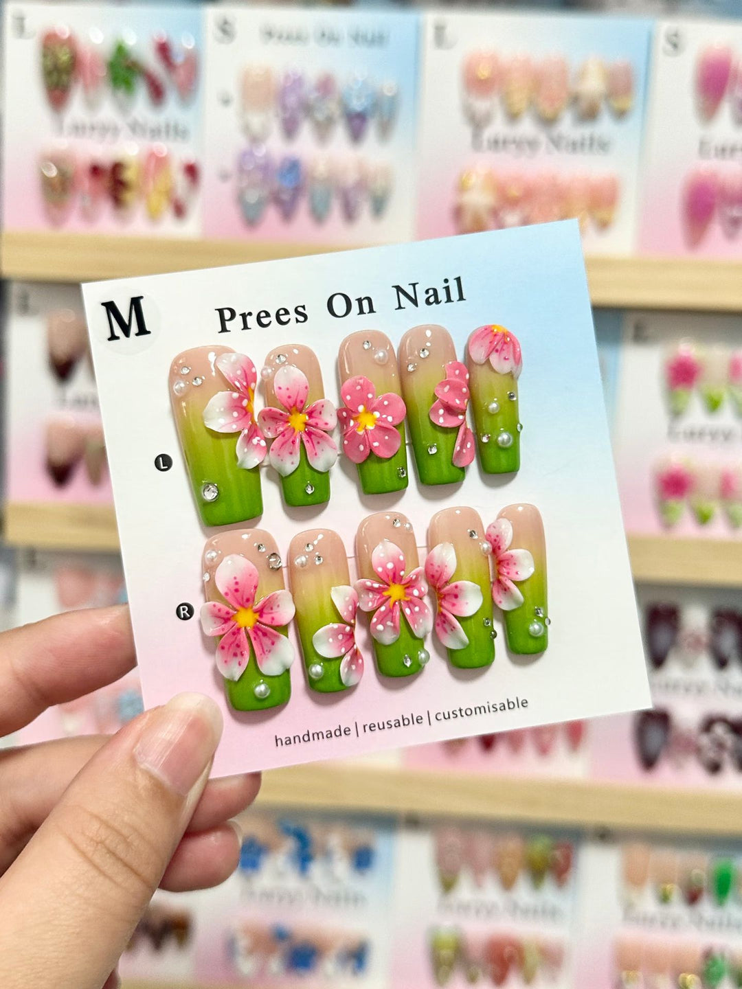 Artistic Press-On Nail Set with Floral and Green Accents