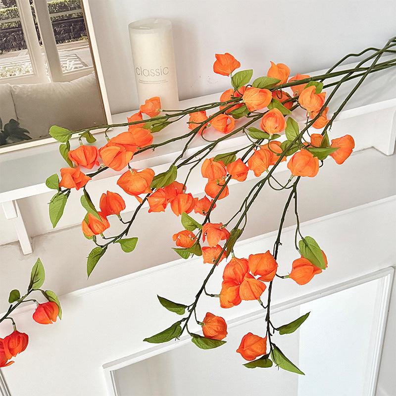 Artificial flower branch with fine, vibrant flowers and natural look