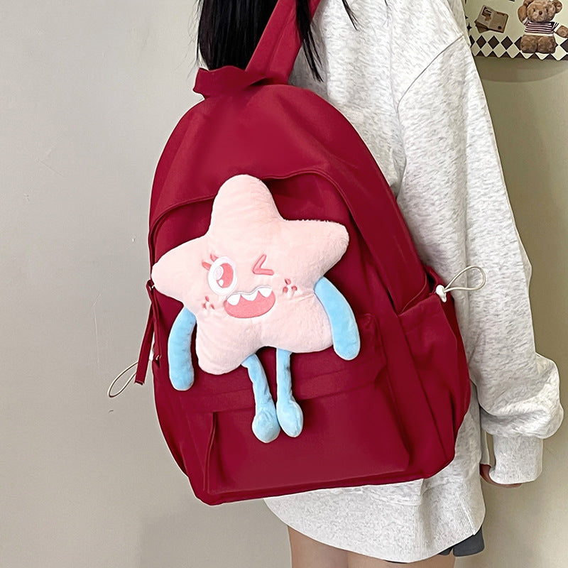 Plush backpack with playful star motif Stornfield