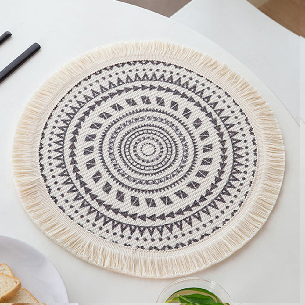 Round woven placemat with fringes and mandala jacquard structure Stornfield