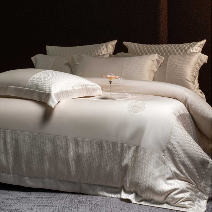 Luxurious satin bedding set with jacquard trim and embroidered coat of arms