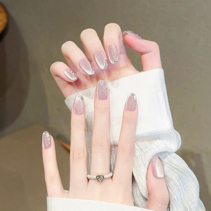 Elegant artificial nail tips with glitter effects Stornfield