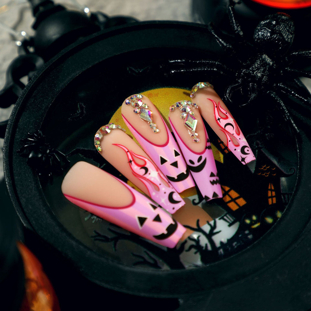 Artificial nail art with festive design and glitter variations Stornfield