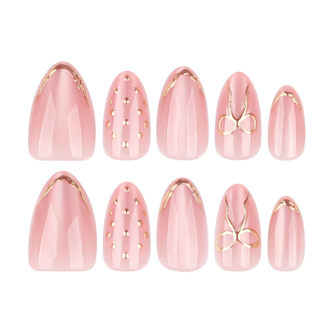 Artful nail extensions with elegant golden accents Stornfield