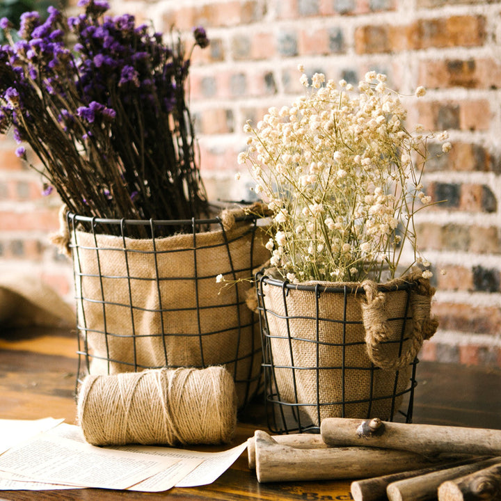 Decorative storage basket made of wire and linen Stornfield