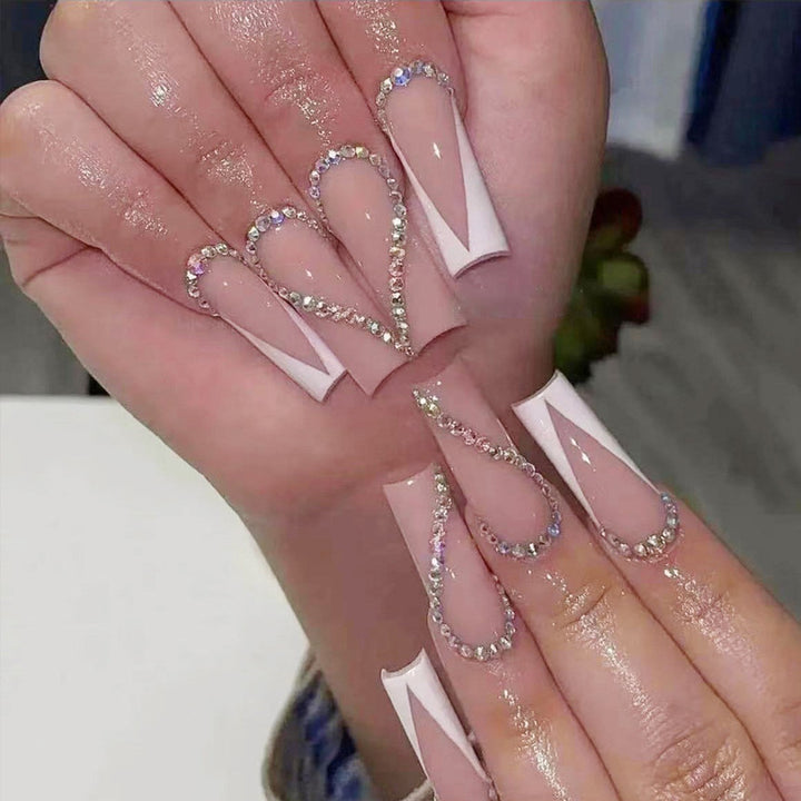 Stylish Press-On Nail Design with Elegant Rhinestone Accents Stornfield