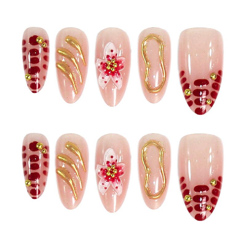 Creative nail art set with floral embellishments and glamorous accents Stornfield
