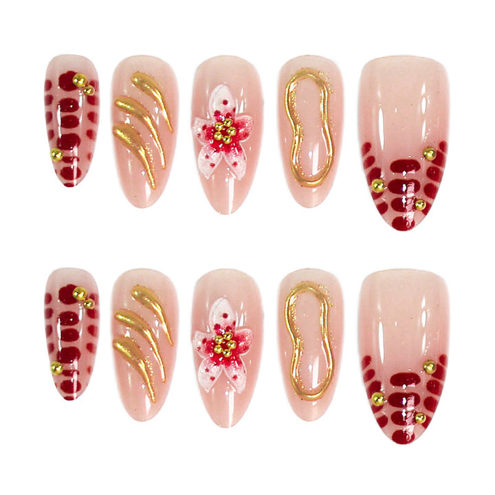 Creative nail art set with floral embellishments and glamorous accents Stornfield