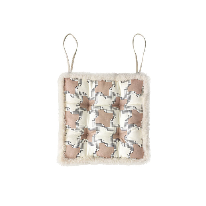 Padded seat cushion with fastening straps, quilted tufting surface and faux fur trim Stornfield