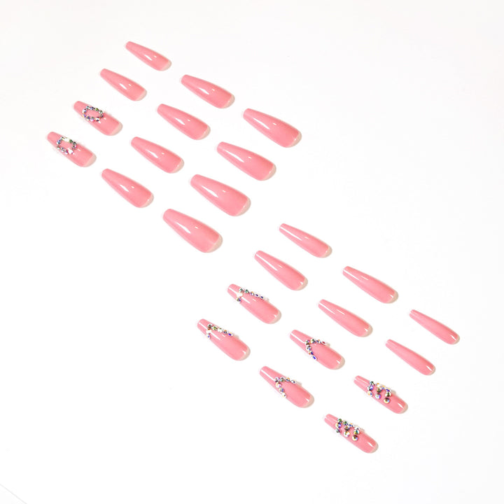 Artificial nail extensions with elegant rhinestone embellishments Stornfield