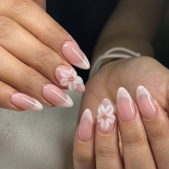 Artistic acrylic nails with elegant flower designs Stornfield