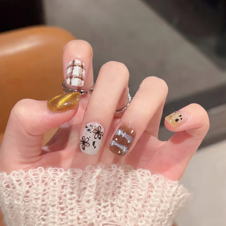 Artistic Press-On Nail Set with Unique Design Elements Stornfield