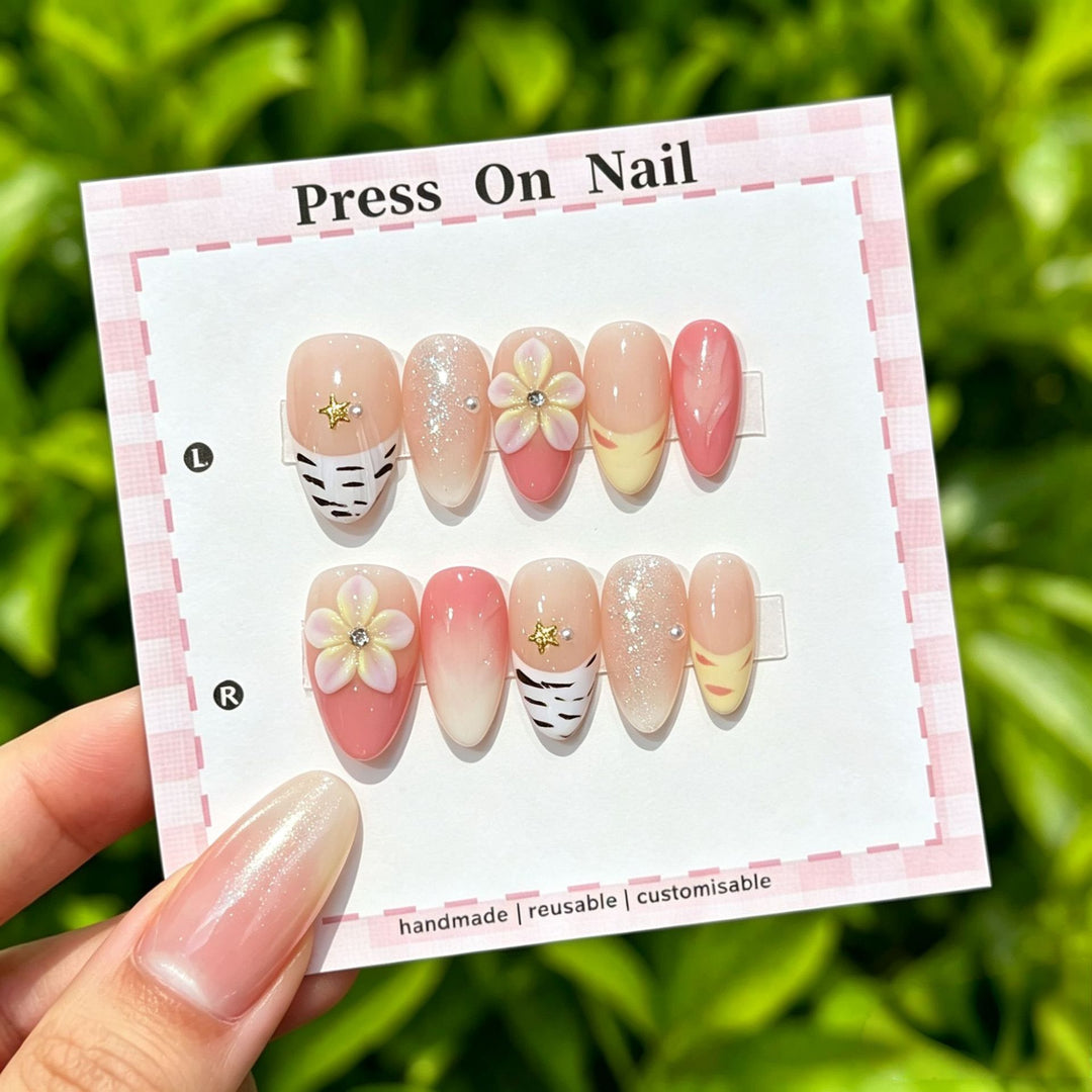 Artistic Press-On Nail Set with Tropical and Floral Accents