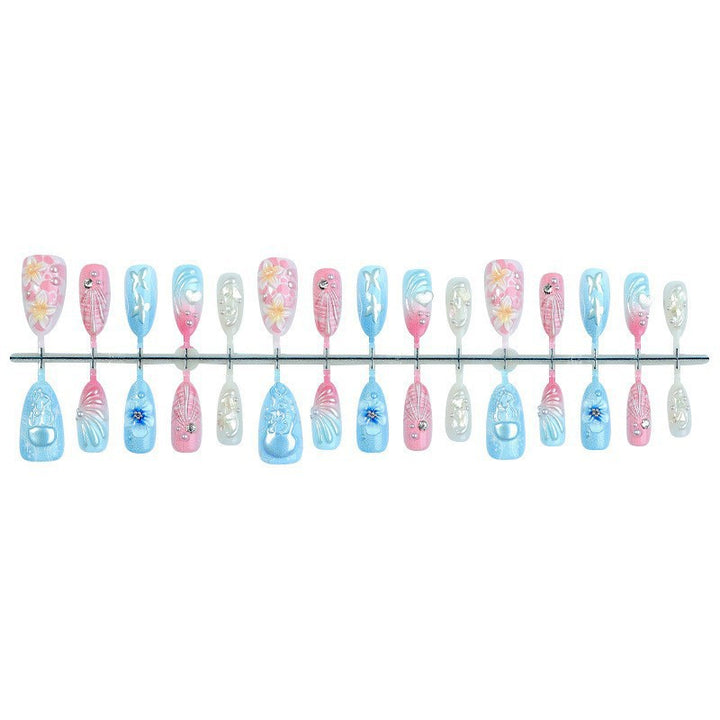 Artificial nail set with maritime motifs and colorful accents Stornfield