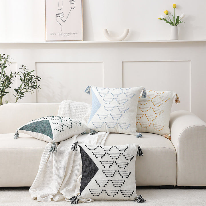 Woven decorative cushion cover with geometric tuft pattern, tassels and concealed zipper