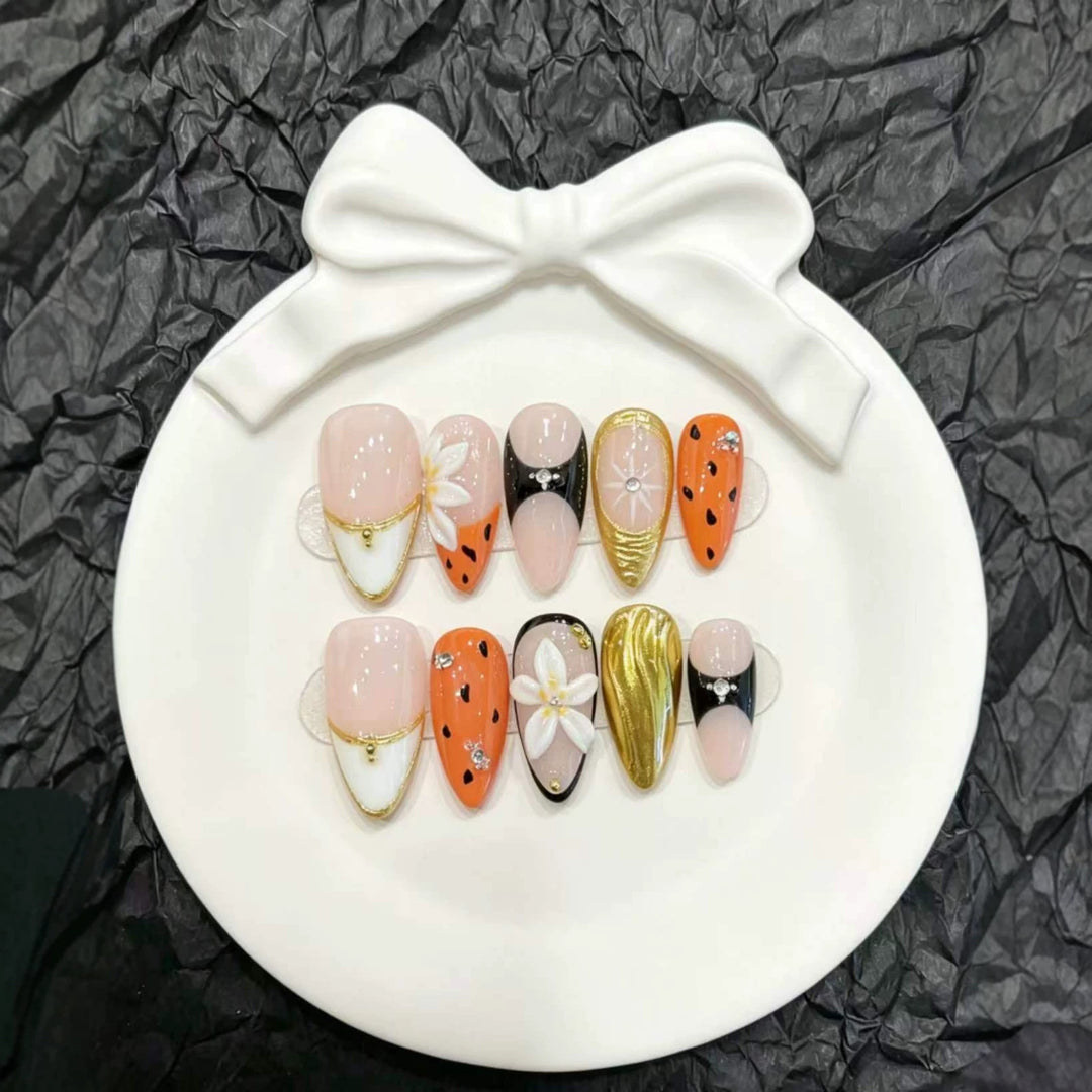 Decorative Press-On Nail Art Set with Floral and Metallic Accents