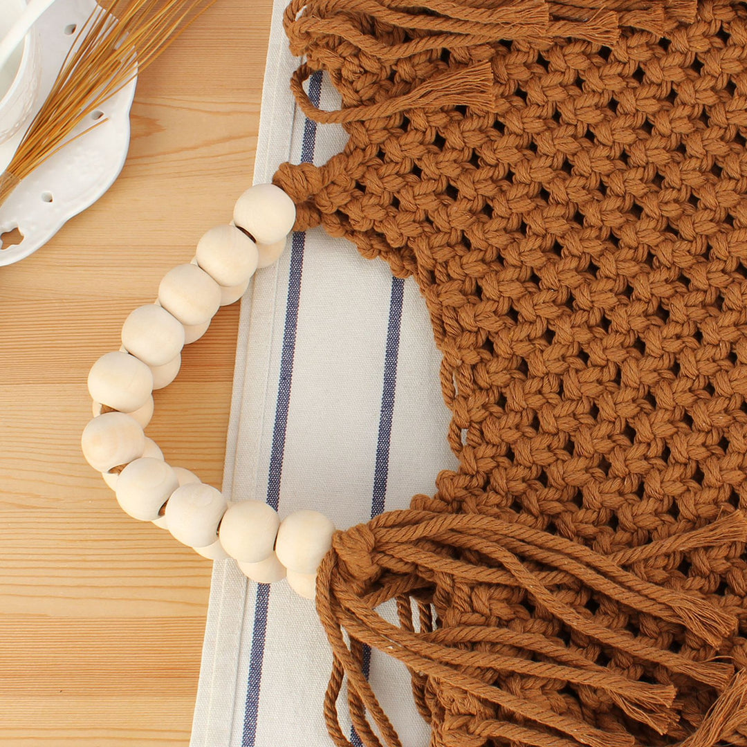 Creative crochet handbag with decorative fringes Stornfield