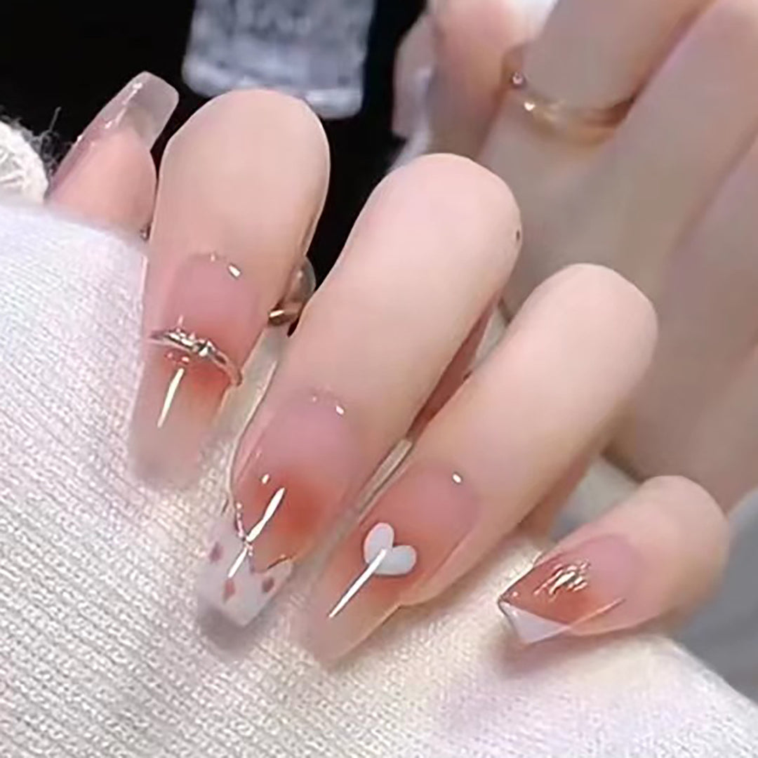 Elegant Long Press-On Nails with Artistic Heart and Gem Accents Stornfield