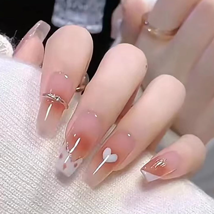 Elegant Long Press-On Nails with Artistic Heart and Gem Accents Stornfield