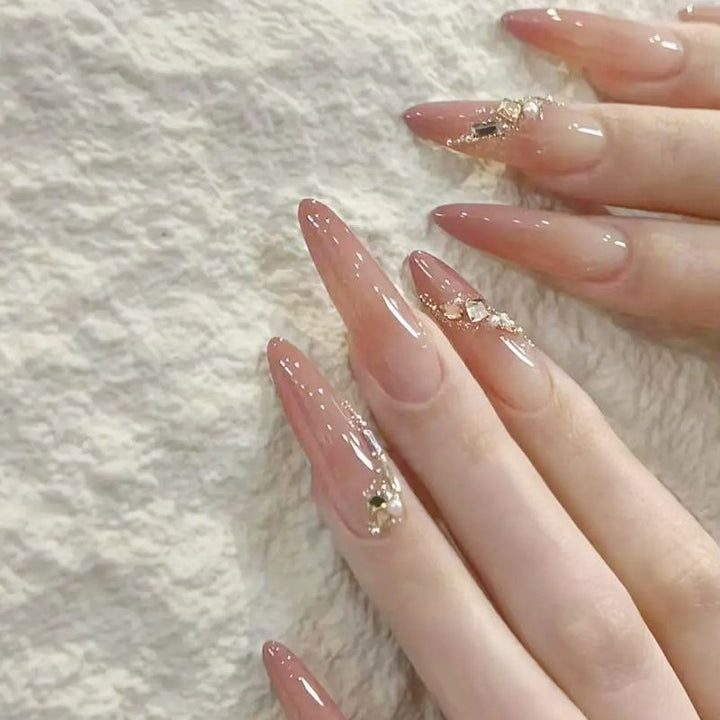 Glamorous artificial nail tips with elegant decorations Stornfield