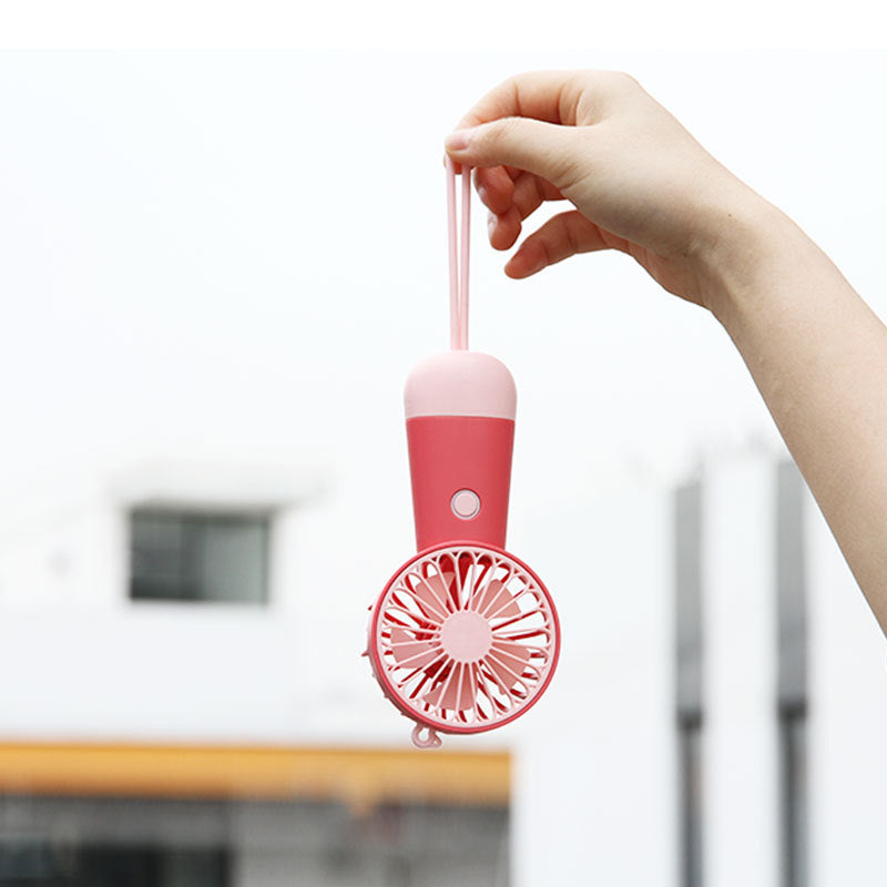 Women's portable handheld fan with ergonomic design and USB charging function Stornfield