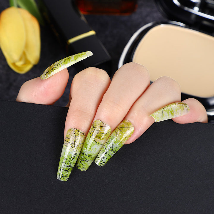 Creative nail art with blood splatter design Stornfield